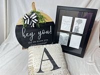Group shot of welcome sign, collage frame, and letter A pillow