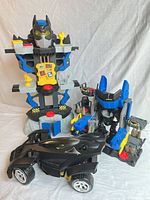 Overall lot showing Batcave, robot, Batmobile