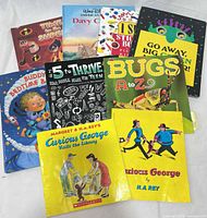 All ten book fronts displayed