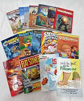 All 16 books laid out