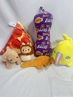 Group shot of all five plush items