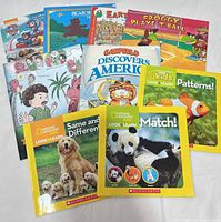 All nine children’s books fanned out showing covers