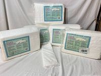 Five packs of Rearz Overnight Booster Pads on white backdrop