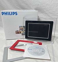 All components—photo frame, trim frames, CD, box—group shot