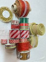 Group view of all 18 ribbon spools showing colours, patterns and widths