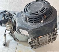 Full view of Toro engine showing recoil cover and mounting base