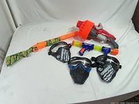 All items: both blasters and three masks displayed together