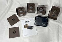 Full kit: four sensors, receiver, two mounting plates, manual
