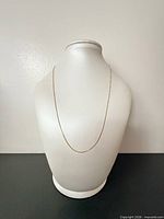 Chain displayed on bust to show overall length and drape