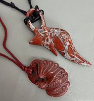 overview of both stone pendants on cords
