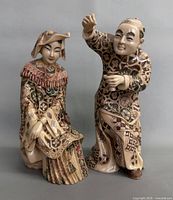 Front view of both figurines