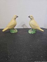 Front view of two ceramic doves