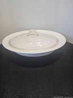 Casserole with lid on, showing oval form and rim