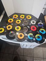 All 18 records laid out showing labels