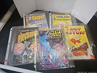 Group shot of all five bagged comics