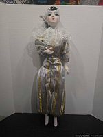 Full front view of porcelain doll