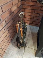 Full view of stand with hanging tools in corner