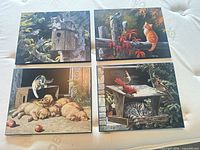 All four animal plaque pictures side by side