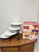 Server assembled showing stand and four plates