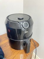 Overall view of T-fal air fryer on table