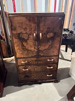 front view of Art Deco cabinet showing doors and drawers