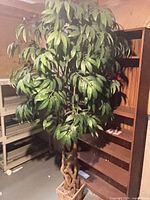 Full view of artificial tree with foliage