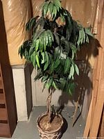 Full view of artificial tree showing height and foliage
