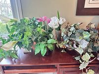 All five artificial plant arrangements on tabletop
