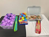 All items: Crazy Forts balls and rods, Octa-Clips connectors, Tinkertoy parts, Jenga box