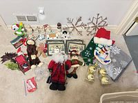 overview of assorted Christmas items on floor