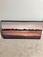 Full view of framed landscape art front