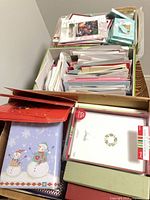 overview of containers filled with greeting cards