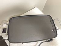 Top view of entire Hamilton Beach griddle showing cooking surface and handles