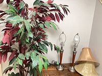 Artificial tree, two lamps and shade overview