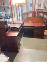 Overall view of L-shaped desk assembled in basement