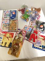Group view of all blister-card and polybag Ty Teenie Beanies on table