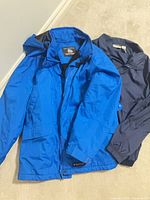 Both jackets laid flat