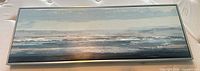 Full view of framed abstract ocean painting