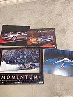 Overview of all four posters on floor