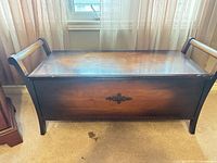 Full view of Honderich cedar chest showing front, lid, and sleigh ends