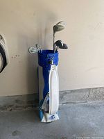 Full view of Cooper bag standing with clubs visible