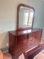 Front view of dresser with mirror