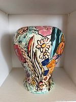 Side view with floral motif