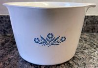 Side view of Corning Ware measuring cup showing Cornflower motif