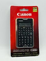 Front view of sealed Canon F-605G calculator on blister card