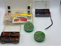 Overall view of tackle boxes, PowerBait, hook organizers and stringer
