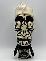 Front view of Achmed plush showing facial details and skeletal design