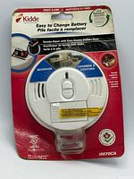 Front of sealed Kidde i9070CA smoke alarm package