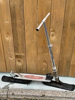Side view of Razor scooter showing both skis attached