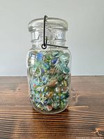 Front view of Ball Ideal jar filled with marbles